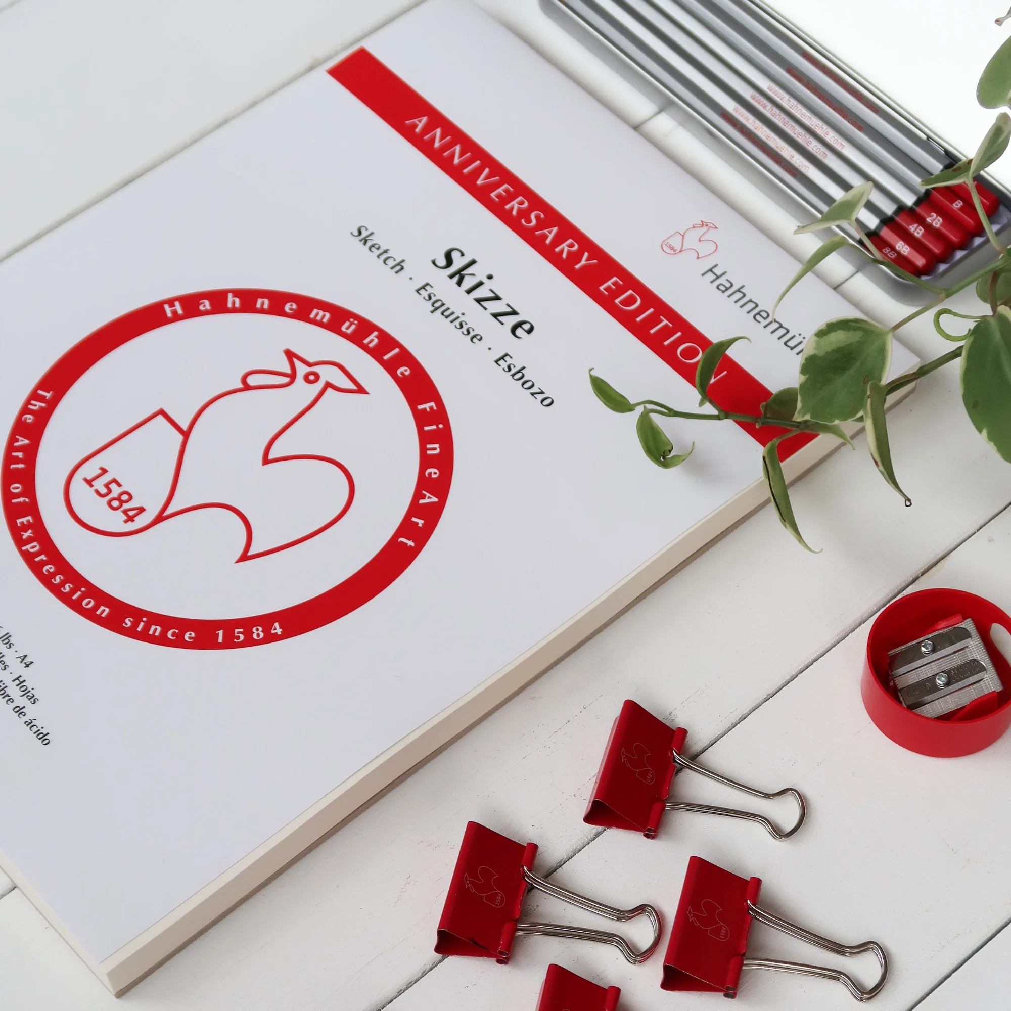 sketch, anniversary edition, red binder clips, pencil sharpener, notebook design