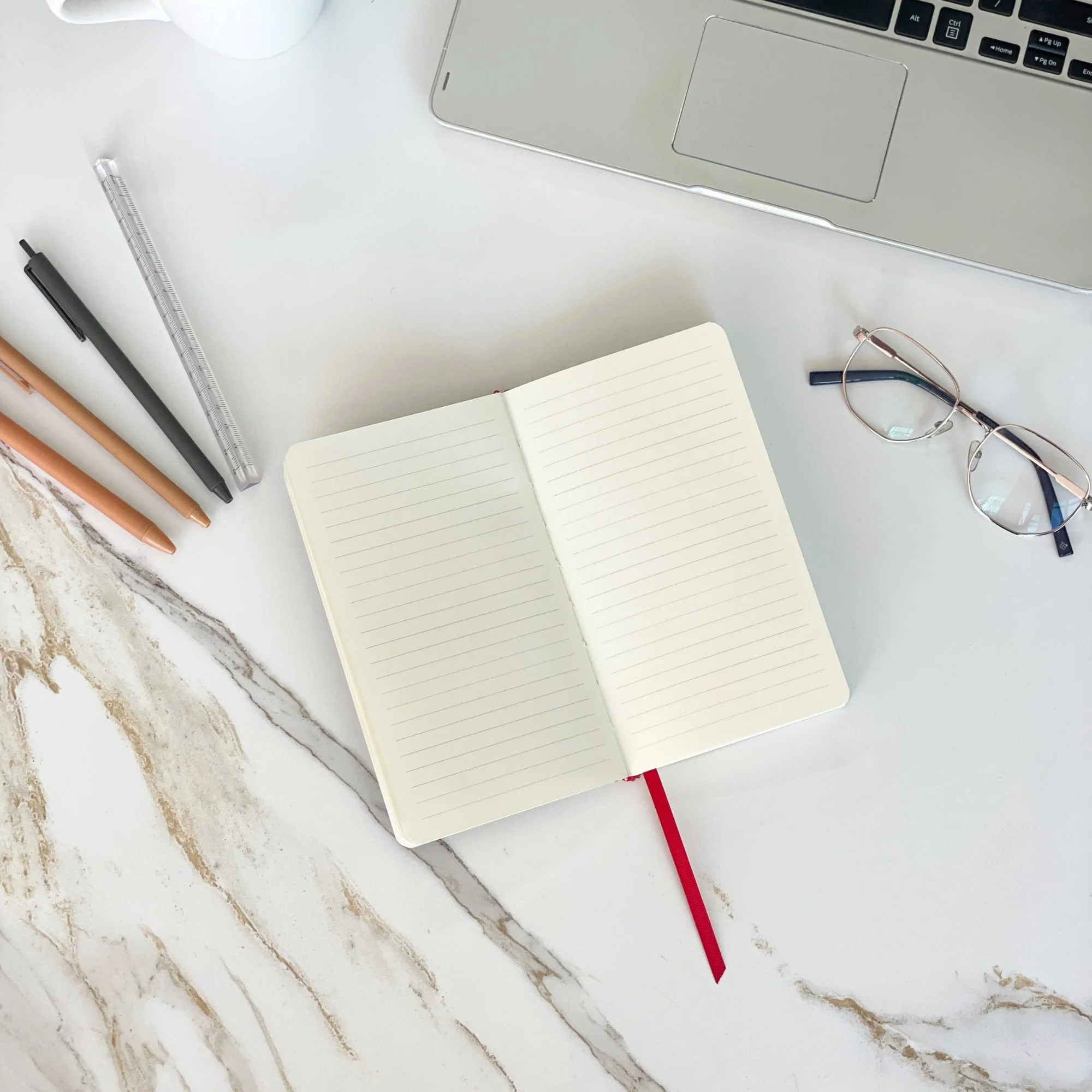 notebook, open notebook, lined notebook, red bookmark, desk setup