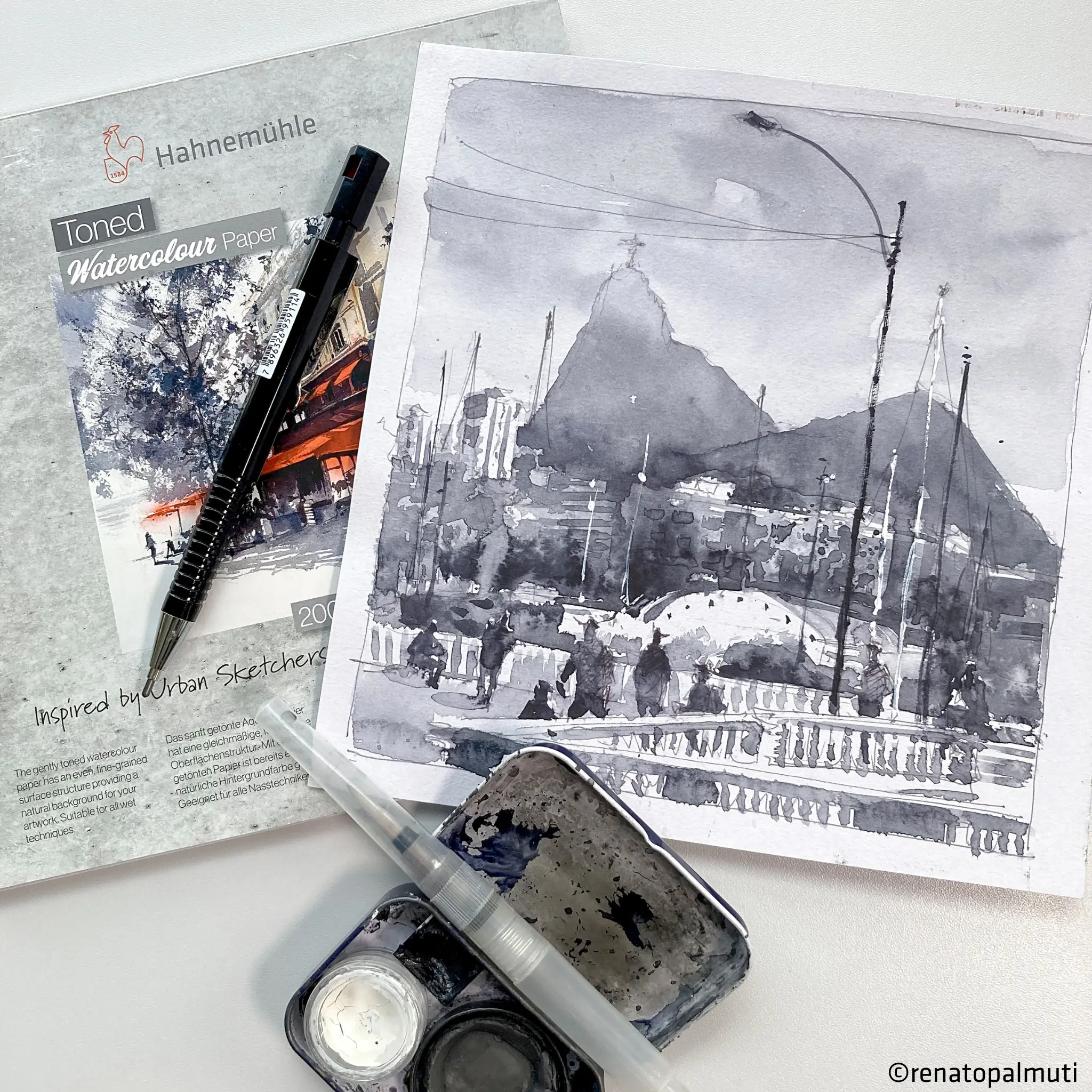 watercolor paper, sketchbook, black pen, ink wash, mountain scene