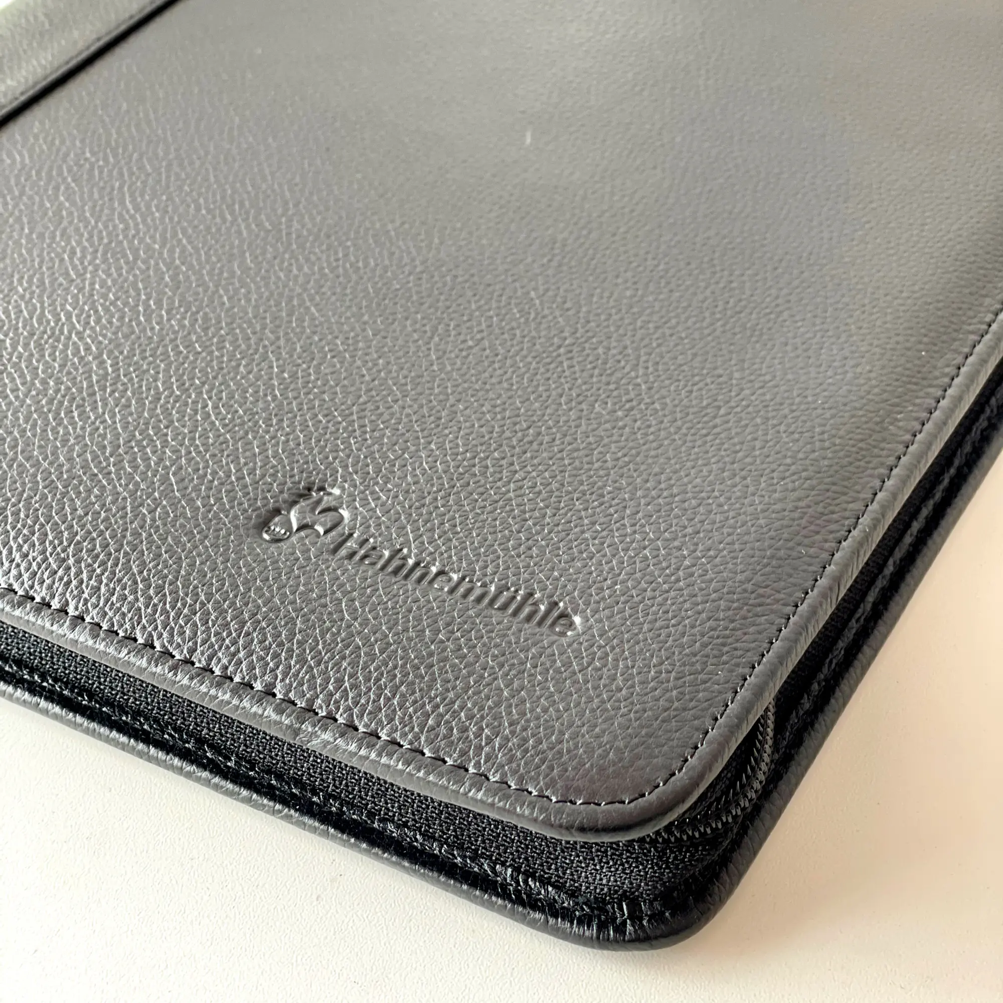 leather, zippered case, gray, textured, wallet-like